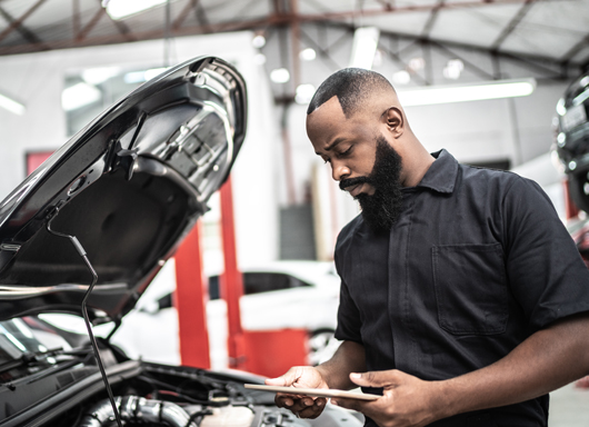 Technician using a tablet.